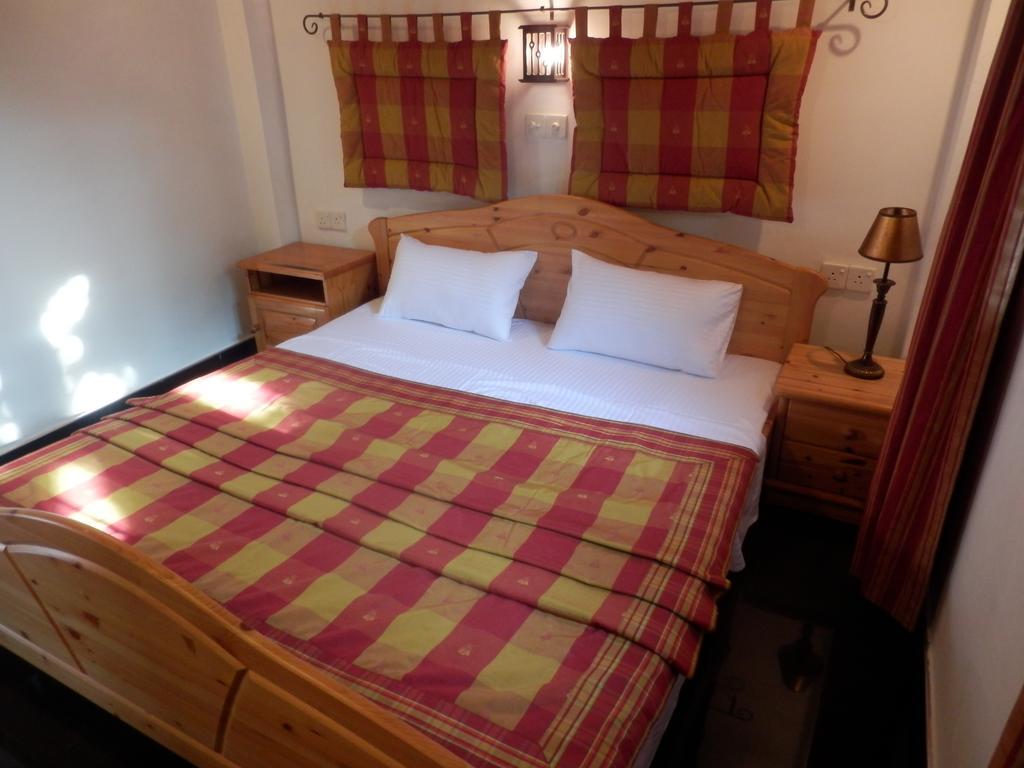 Ronny Cottage Negombo Quarto foto