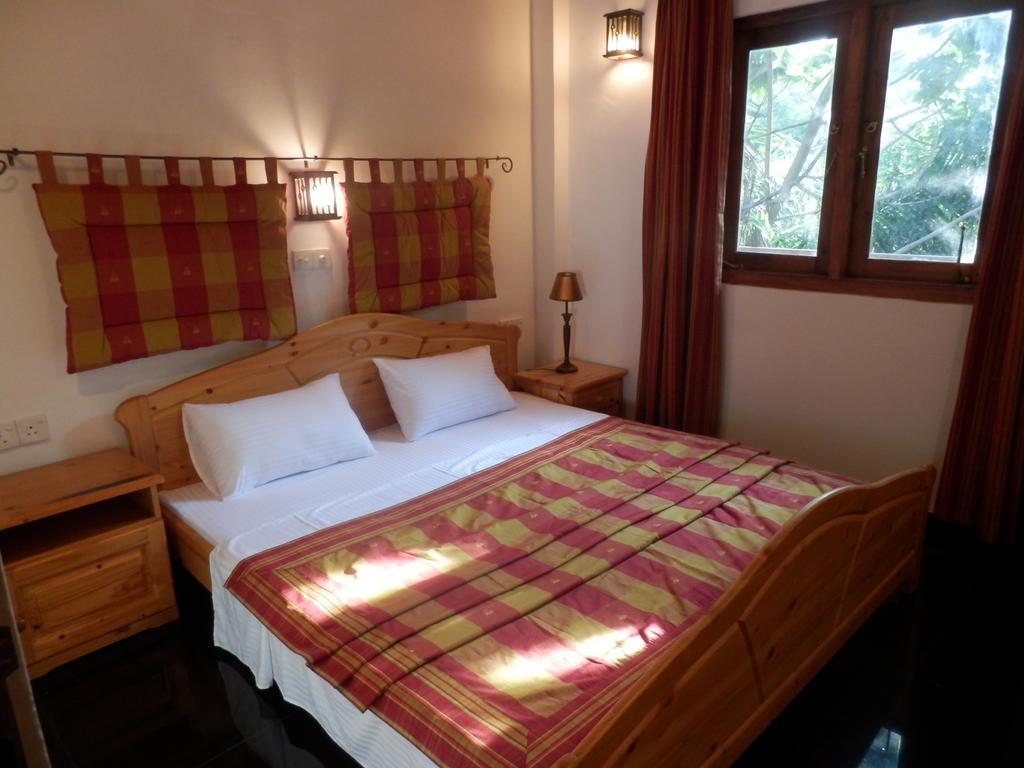 Ronny Cottage Negombo Quarto foto